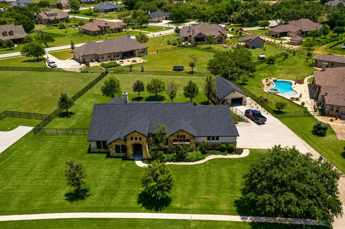 Completed roof on a large Rio Grande Valley home by Texas Contractors, Inc.
